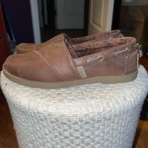 Brown leather bobs